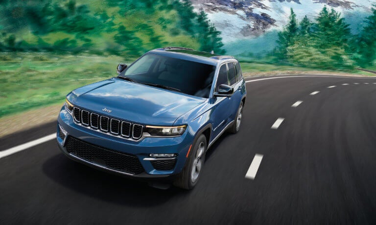 2025 Jeep Grand Cherokee driving on a highway